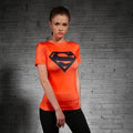 products-supergirl-orangeblack-compression-short-sleeve-rash-guard-1.jpg