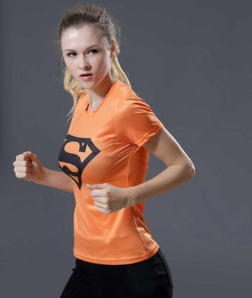 products-supergirl-tangerine-compression-short-sleeve-rash-guard-1.jpg